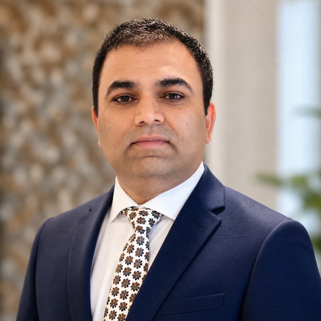 Atul Pathak, PhD, founder of Kinstead Home Care, in his office